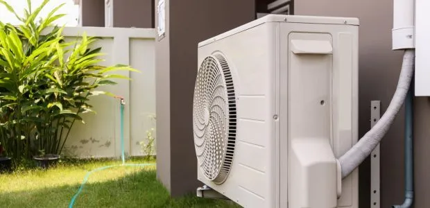 An outdoor air condition unit installed outside the house